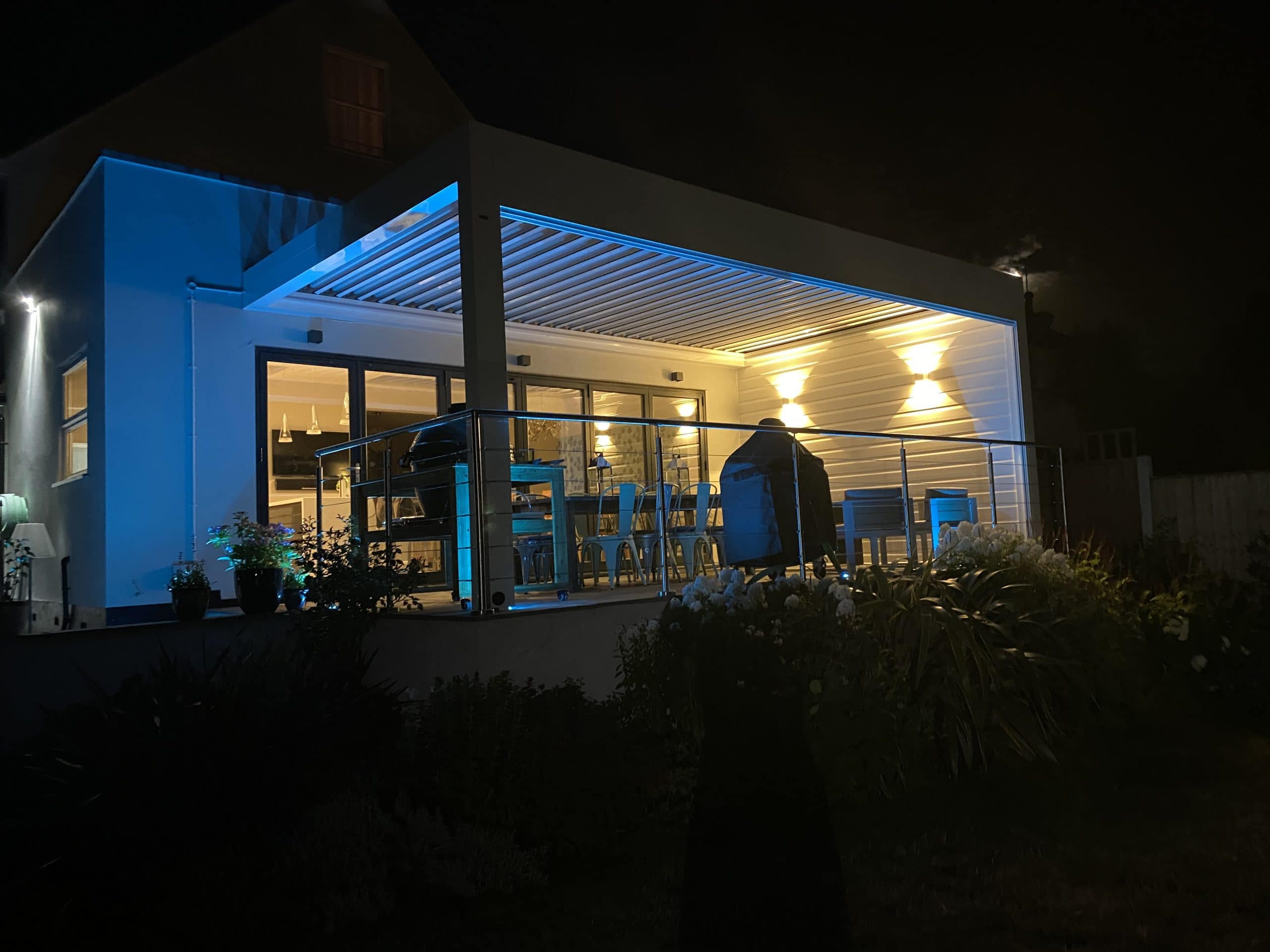 Louvered Pergola Outside Dining Area in Weybridge, Surrey